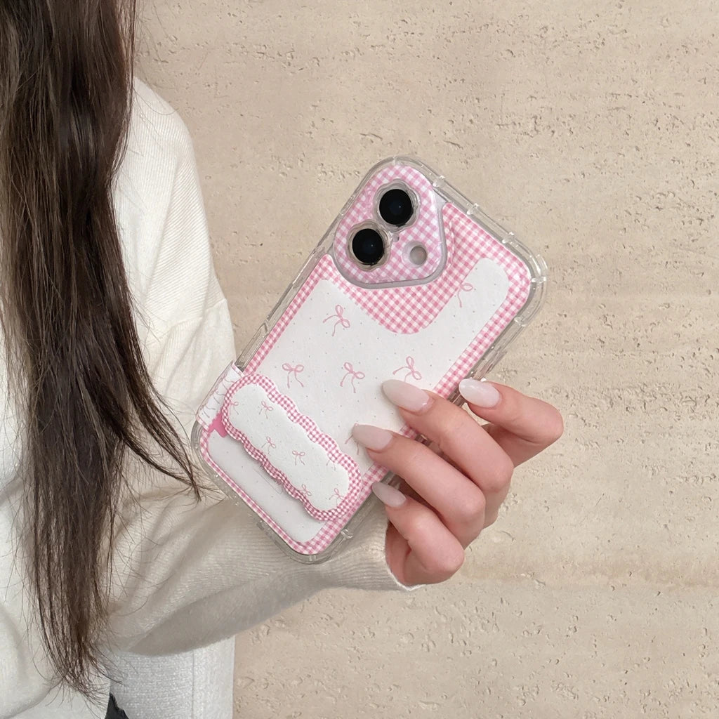 【ピンクギンガムチェック】リボン柄 折りたたみ式ホルダー付き スマホケース｜iPhone対応 #240622