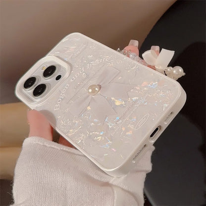 【パール×リボンチャーム】艶めく ホワイト シェル風ケース｜iPhone対応 #250525
